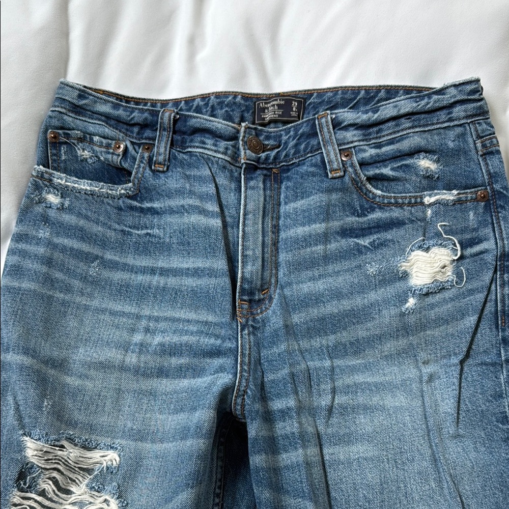 Distressed Blue Jeans